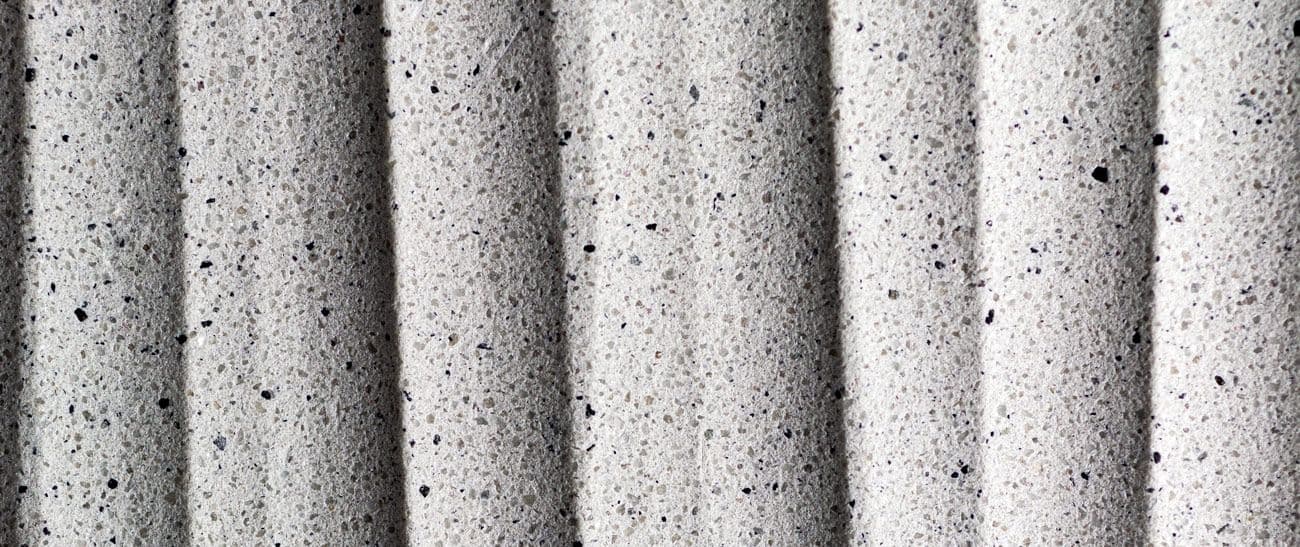 TAKTL KORSA exposed aggregate panel surface